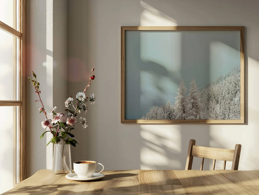 Analog film photograph of two snow-covered pine trees standing against a misty alpine backdrop, capturing the quiet stillness of winter framed in maple shot on 120mm.