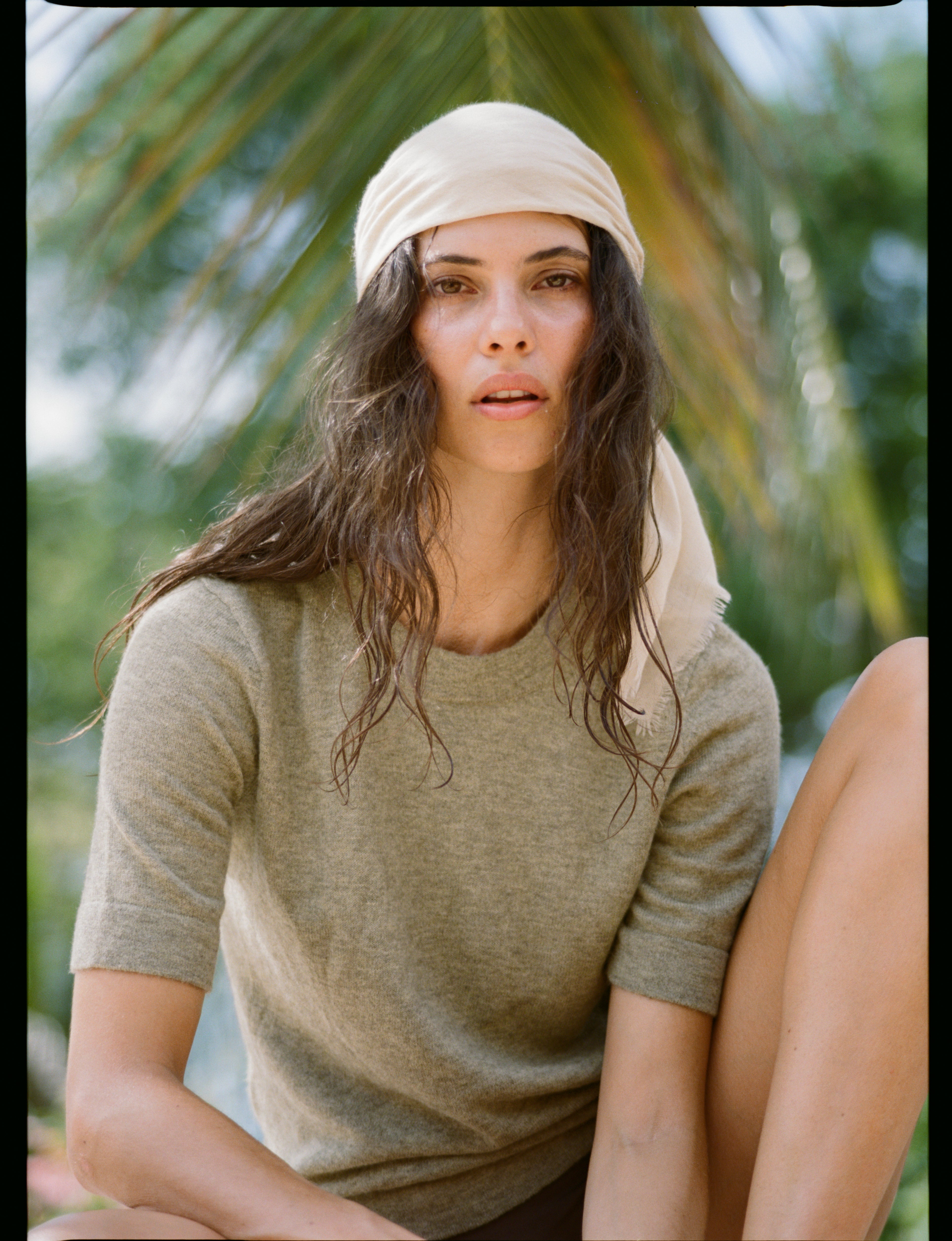 Analog fashion portrait of Courtney in Lamu, Kenya wearing OAD, with headscarf and soft natural light, shot on medium format film