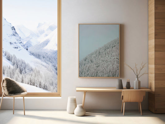Analog film photograph of a snow-covered mountain slope in the Swiss Alps, showing layers of pines fading into soft winter light shot on 120mm.