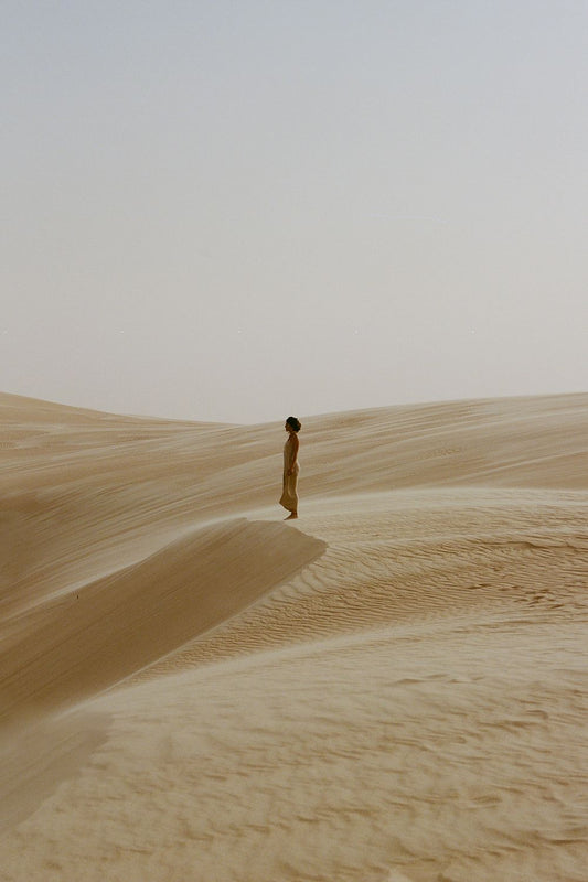 Fine art analog photography print, lone figure on Sahara sand dunes, Egypt, shot on medium format film, Jade Capaldi